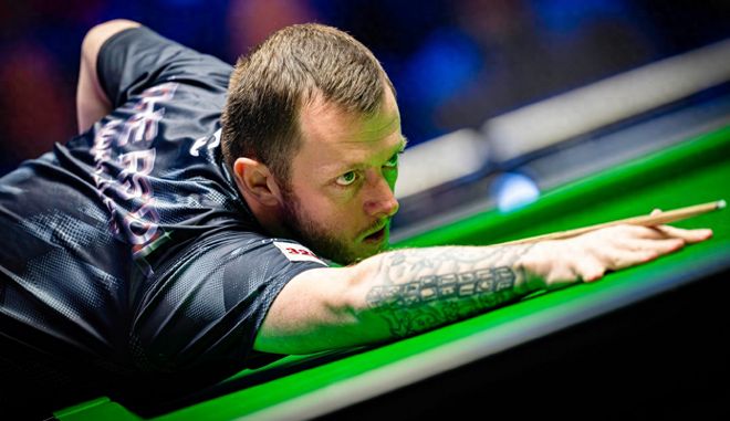 他在繁重的 他在繁重的